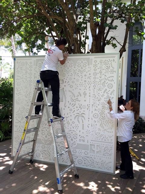 A CNC-cut PVC backdrop, on-site