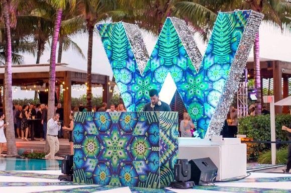 A twelve-foot tall W activation, built to be the center of the event's nightlife
